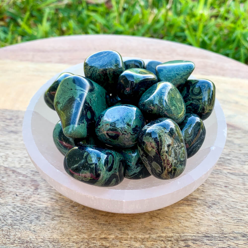 Looking for Kambaba Jasper stones? Find the best Rhyolite Kambaba Jasper Tumbled Stone at Magic Crystals. Kambaba Jasper Tumbled Stone,  Healing Rhyolite Stones, Natural Kambaba Green Jasper, Kambaba Reiki Crystal, and more with FREE SHIPPING available. Kambaba Jasper is a stone of peace, tranquility, 