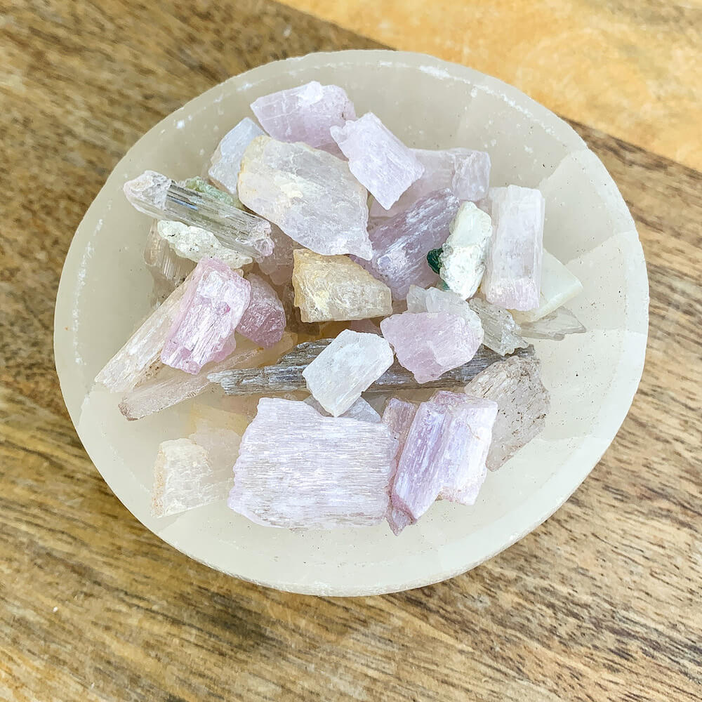 Buy Raw Purple Kunzite Gemstone chunks - Choose how many stones, Singles, or Bulk at Magic Crystals. Kunzite pieces are great stones for communication, love, healing, energy, energy blockage. FREE SHIPPING Crystal Gift, Constellation Gift, Gift for Friends, Gift for sister, Gift for Crystals Lovers at Magic Crystals.
