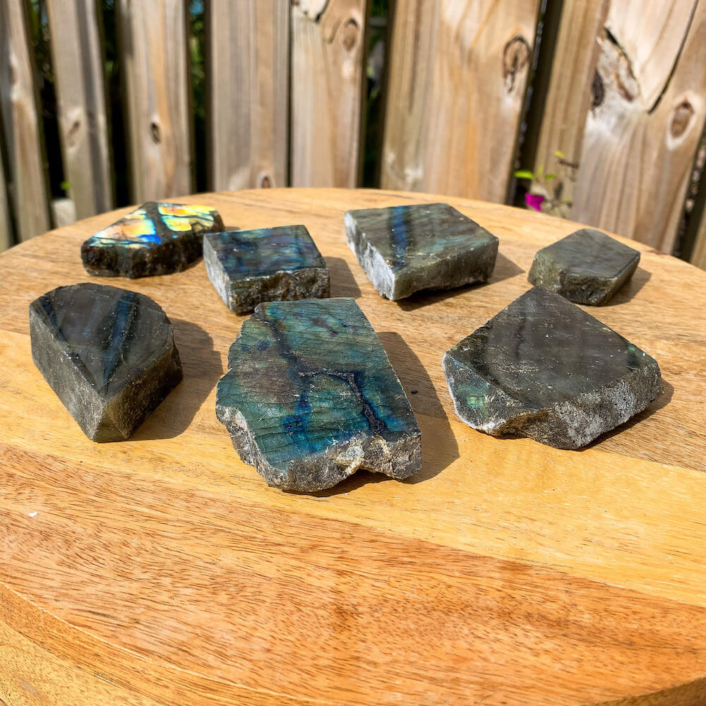 Looking for polished labradorite? Shop at Magic Crystals for Labradorite Stone Slab - Free Form Labradorite. Empathetic, supporting and glowing with soft, pretty color, this Labradorite palm stone is a wonderful crystal gift for someone you love. Our Palm Stones have a thumbprint indentation perfect for meditation, pocket stone, or worry stone.