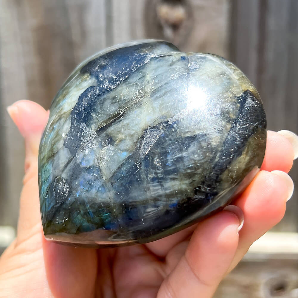 Looking for polished labradorite? Shop at Magic Crystals for Labradorite Stone Heart - Labradorite Carving. Empathetic, supporting, and glowing with soft, pretty color, this Labradorite palm stone is a wonderful crystal gift for someone you love. FREE SHIPPING available.