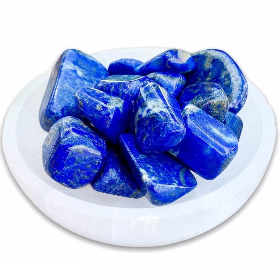 Buy Lapis Lazuli Tumbled Stones, Lapis Lazuli Polished Gemstones, Bulk Crystals, Polished Blue Stone at Magic Crystals. Lapis Lazuli can help with focus, wise, thinking, and memory. Intellectually stimulating. FREE SHIPPING available. Polished Lapis Lazuli best queality.