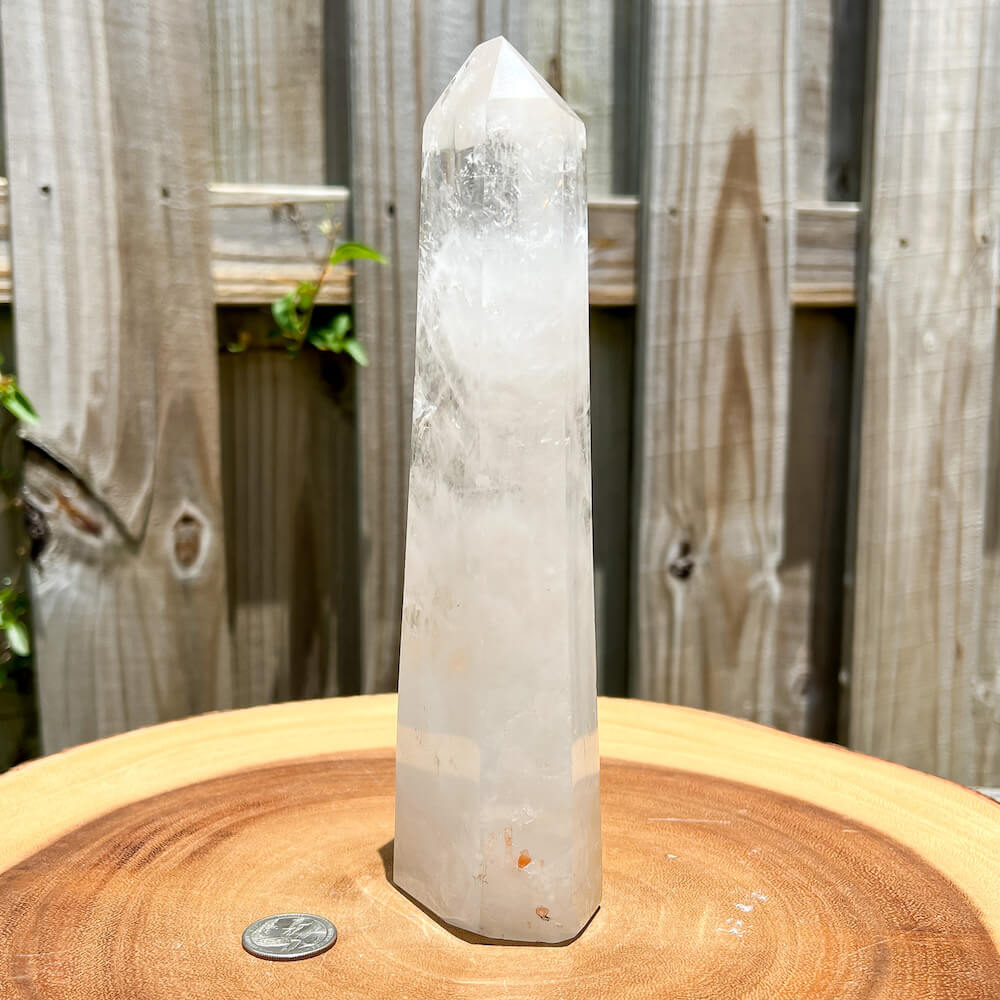 Clear Quartz Obelisk - Clear Quartz Tower  at Magic Crystals. These Vesuvianite obelisks hold a power all their own as they symbolize the ancient obelisks found in Egypt. Shop Clear Quartz obelisks, wands, and pencil points. Crystal Clear quartz is the most recognized type of crystal. FREE SHIPPING AVAILABLE. 