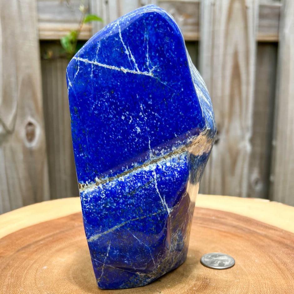 Large Lapis Lazuli Lazurite Polished from Afghanistan. Lapis Lazuli is a manifestation stone. Shop at Magic Crystals for Natural Lapis Lazuli Crystal, Lapis Lazuli Point Wand,  Lapis Lazuli tower, Generator Hexagonal Point (Reiki Healing Wand Point). We carry genuine Lapis Lazuli jewelry, and collector pieces.