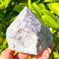 Lepidolite-Power-Point. Looking for a Polished Point - Stone Points - Crystal Points - Power Point - Crystal Point Large - Crystal Point Tower - Stone Point? MagicCrystals.com has a wide variety of crystal points to power you grid!. These are used as an Alter Crystal Tower.  Magic Crystals offers free shipping! Crystal Grid Point