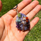 Lepidolite-Tree-Of-Life-Chakra-Necklace. Looking for a gift for mother/her, tree of life necklace, stone necklace, pendant? Shop at Magic Crystals for a 7 Chakra Tree Of Life Drop Necklace. 7 Chakra necklaces, and seven chakras jewelry pieces. Handmade Natural Amethyst Crystal. Amethyst Drop shape, teardrop, Protection Necklaces. 