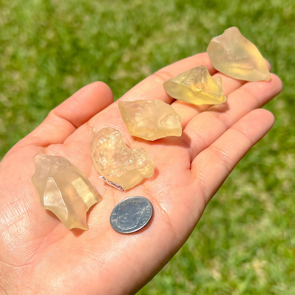 Looking for authentic real Libyan Desert Glass? Shop at Magic Crystals for Lybian Tektite 6-10 grams unique pieces by the gram. Yellow and gold tektite from Libya and Egypt. FREE SHIPPING available. Libyan Desert Glass will range between 5-30 mm depending on weight. Rare Tektite at MagicCrystals.com
