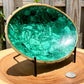Buy Malachite Home decor? Shop at Magic Crystals for Genuine 1.2 lbs Malachite Oval Bowl - Malachite from Congo, Circular Malachite Bowl with Gold Rim Great for Crystal Grids. malachite aesthetic, malachite jewelry, malachite stone, malachite crystal meaning. Malachite is known as a protection stone.