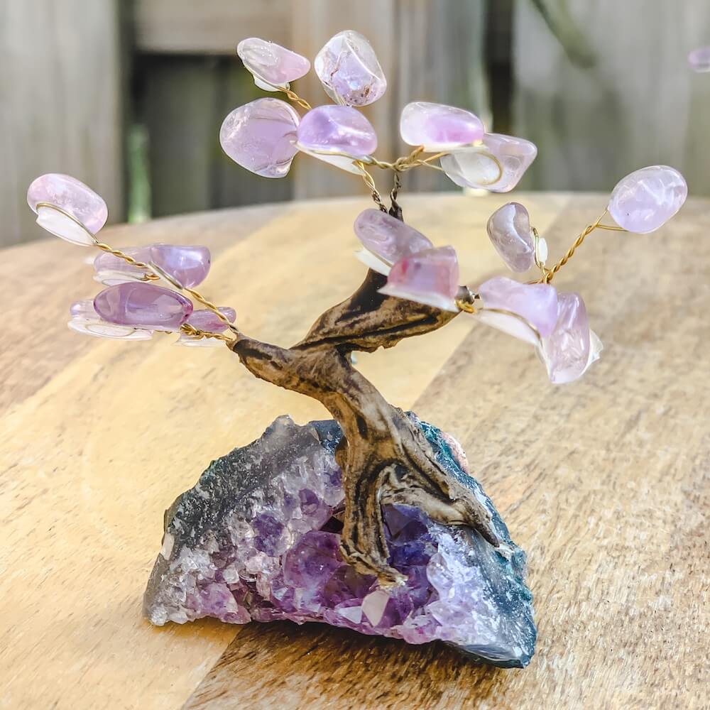 Looking for crystal home decor? Shop at Magiccrystals.com for Mini Purple Amethyst Bonsai Tree on Amethyst Cluster. Magic Crystals has a variety of HOME DECOR made of crystals and gemstones. Amethyst is a powerful and protective stone. Gemstone tree. Birthstone tree sculpture. Amethyst geode gift. FREE SHIPPING