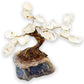 Buy Raw Mini Clear Quartz Bonsai Tree on Amethyst Cluster in Magic Crystals. Green Aventurine is great for Programmability, amplification of one's intention, magnification of energies, clearing, cleansing, and healing. Magic Crystals has a variety of HOME DECOR made of crystals and gemstones. Birthstone tree sculpture.