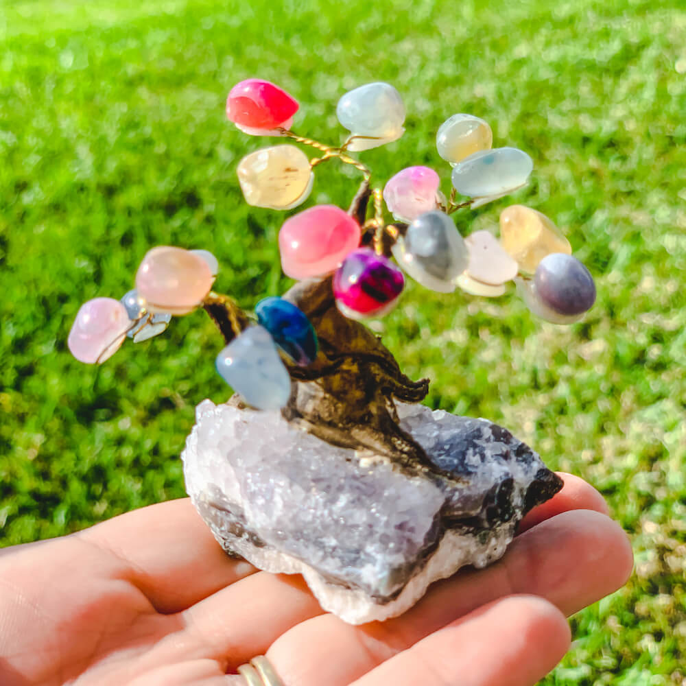Looking for crystal home decor? Shop Mini Multi Stone Bonsai Tree on Amethyst Geode  at Magic Crystals. Magiccrystals.com carries variety of gemstone trees and home decor! Free shipping available  FREE SHIPPING available. 