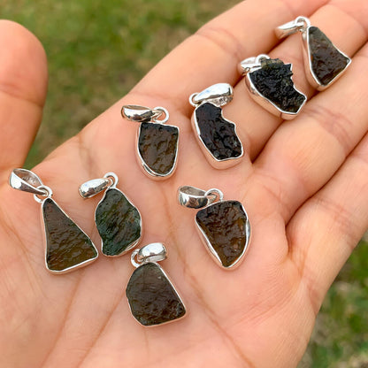 Authentic Moldavite Jewelry - Meteorite Necklace - Healing Moldavite Jewelry - Moldavite available. Looking for an Moldavite Necklace? Find Moldavite Meteorite tektite Necklace when you shop at Magic Crystals. Authentic Moldavite Meteorite Crystal Healing Pendant Necklace. Moldavite pendant. Shop Magic Crystals.