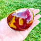 Looking for Mookaite Jasper stones? Shop at our crystal shop for genuine Mookaite Jasper Polished gemstone, Mookaite Jasper Stone, red Sodalite at Magic Crystals. Natural Mookaite Jasper or mookaite jasper is a powerful reminder of the ageless spirit by raising the vibration of the physical vehicle. FREE SHIPPING