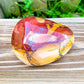 Looking for Mookaite Jasper stones? Shop at our crystal shop for genuine Mookaite Jasper Polished gemstone, Mookaite Jasper Stone, red Sodalite at Magic Crystals. Natural Mookaite Jasper or mookaite jasper is a powerful reminder of the ageless spirit by raising the vibration of the physical vehicle. FREE SHIPPING