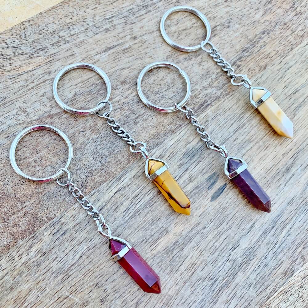 Mookaite Jasper KEYCHAIN. Shop at Magic Crystals for Crystal Keychain, Pet Collar Charm, Bag Accessory, natural stone, crystal on the go, keychain charm, gift for her and him. FREE SHIPPING available. Mookaite Jasper Crystal Key Chain, Crystal Keyring, Mookaite Jasper Crystal Key Holder.