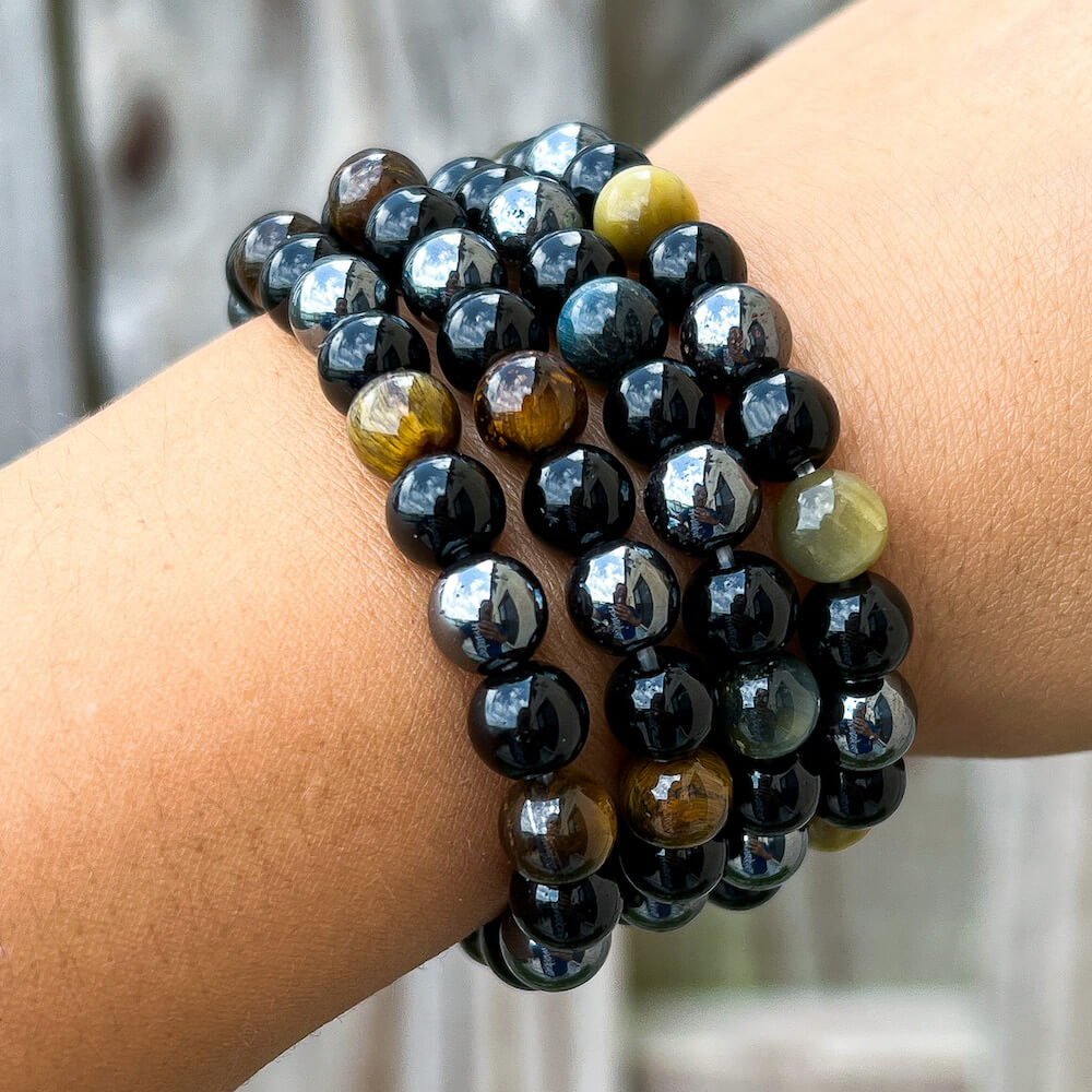 Looking for a protection bracelet? Shop at Magic Crystals for Dreamy Tiger Eye, Hematite, Black Obsidian Bracelet. Bracelet made of natural gemstones Unisex jewelry adjustable bracelet. Color: Black and metallic, gray for Chakra: Third Eye, Solar Plexus, Sacral, Root. FREE SHIPPING