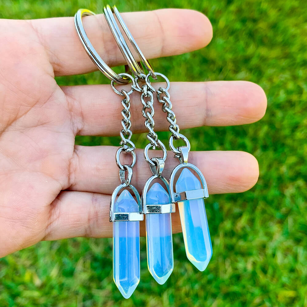 Opalite KEYCHAIN. Shop at Magic Crystals for Crystal Keychain, Pet Collar Charm, Bag Accessory, natural stone, crystal on the go, keychain charm, gift for her and him. Opalite is a great SPIRITUALITY. FREE SHIPPING available. Opalite Crystal Key Chain, Crystal Keyring, Opalite Crystal Key Holder. Opal, opalita stone.