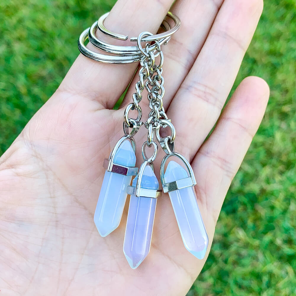 Opalite KEYCHAIN. Shop at Magic Crystals for Crystal Keychain, Pet Collar Charm, Bag Accessory, natural stone, crystal on the go, keychain charm, gift for her and him. Opalite is a great SPIRITUALITY. FREE SHIPPING available. Opalite Crystal Key Chain, Crystal Keyring, Opalite Crystal Key Holder. Opal, opalita stone.