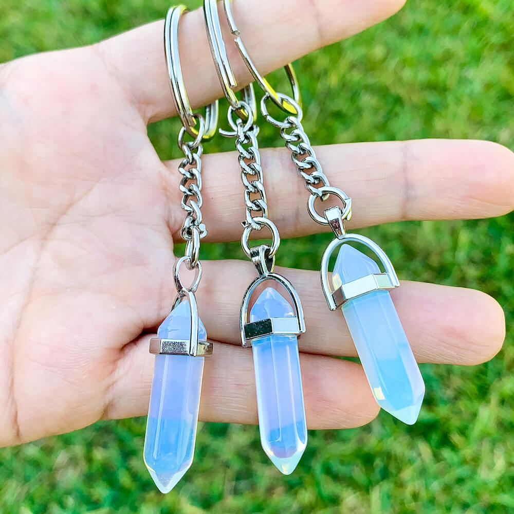 Opalite KEYCHAIN. Shop at Magic Crystals for Crystal Keychain, Pet Collar Charm, Bag Accessory, natural stone, crystal on the go, keychain charm, gift for her and him. Opalite is a great SPIRITUALITY. FREE SHIPPING available. Opalite Crystal Key Chain, Crystal Keyring, Opalite Crystal Key Holder. Opal, opalita stone.