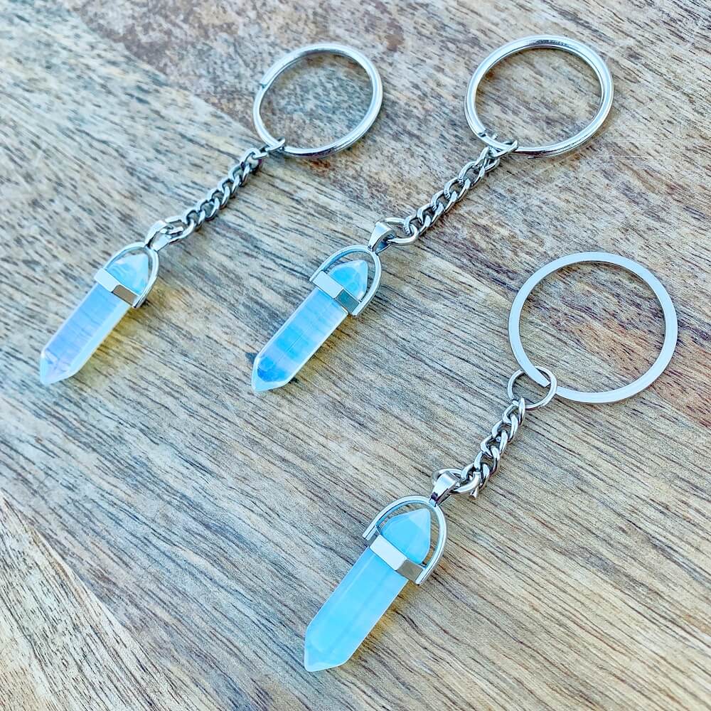 Opalite KEYCHAIN. Shop at Magic Crystals for Crystal Keychain, Pet Collar Charm, Bag Accessory, natural stone, crystal on the go, keychain charm, gift for her and him. Opalite is a great SPIRITUALITY. FREE SHIPPING available. Opalite Crystal Key Chain, Crystal Keyring, Opalite Crystal Key Holder. Opal, opalita stone.