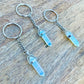 Opalite KEYCHAIN. Shop at Magic Crystals for Crystal Keychain, Pet Collar Charm, Bag Accessory, natural stone, crystal on the go, keychain charm, gift for her and him. Opalite is a great SPIRITUALITY. FREE SHIPPING available. Opalite Crystal Key Chain, Crystal Keyring, Opalite Crystal Key Holder. Opal, opalita stone.