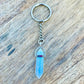 Opalite KEYCHAIN. Shop at Magic Crystals for Crystal Keychain, Pet Collar Charm, Bag Accessory, natural stone, crystal on the go, keychain charm, gift for her and him. Opalite is a great SPIRITUALITY. FREE SHIPPING available. Opalite Crystal Key Chain, Crystal Keyring, Opalite Crystal Key Holder. Opal, opalita stone.