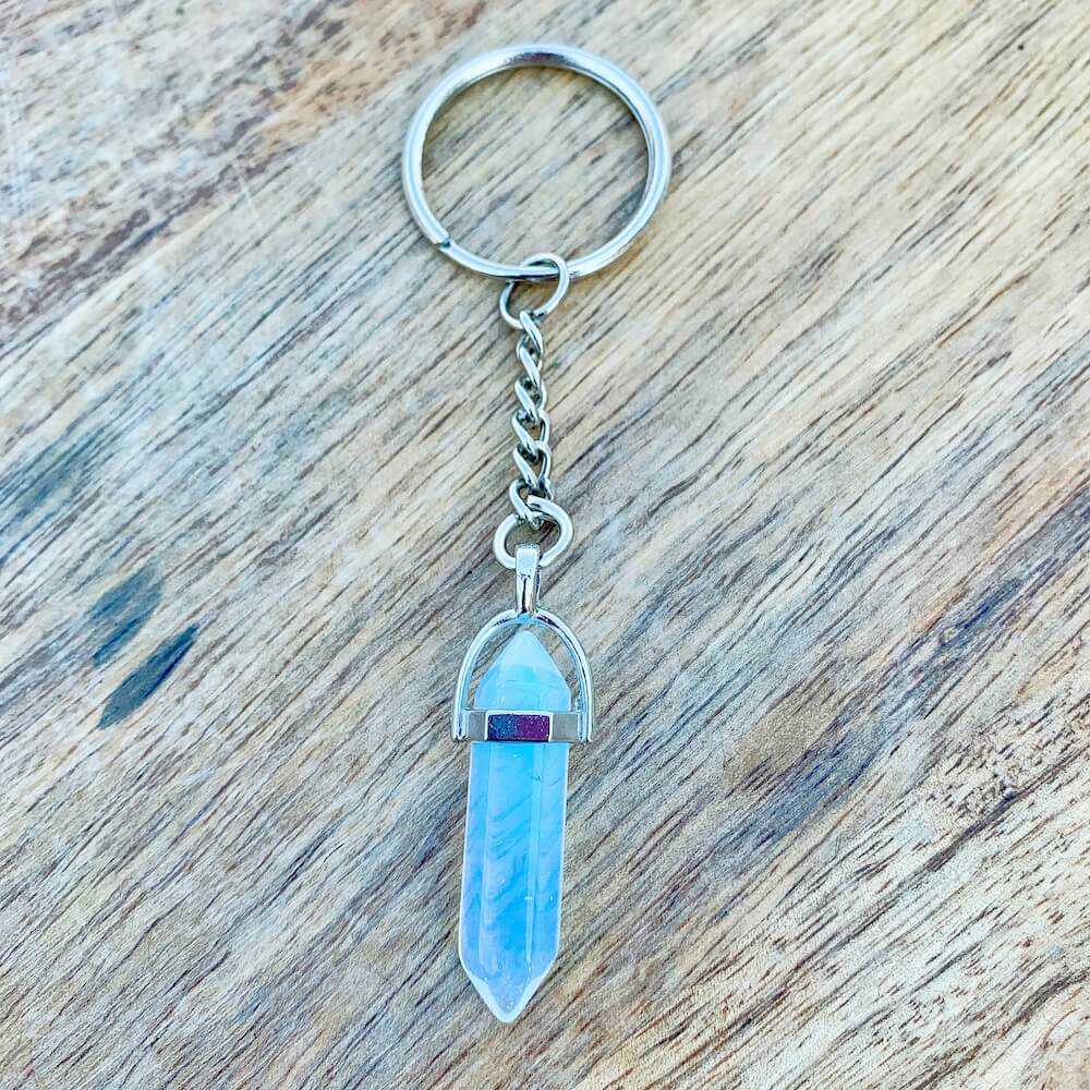 Opalite KEYCHAIN. Shop at Magic Crystals for Crystal Keychain, Pet Collar Charm, Bag Accessory, natural stone, crystal on the go, keychain charm, gift for her and him. Opalite is a great SPIRITUALITY. FREE SHIPPING available. Opalite Crystal Key Chain, Crystal Keyring, Opalite Crystal Key Holder. Opal, opalita stone.