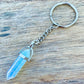 Opalite KEYCHAIN. Shop at Magic Crystals for Crystal Keychain, Pet Collar Charm, Bag Accessory, natural stone, crystal on the go, keychain charm, gift for her and him. Opalite is a great SPIRITUALITY. FREE SHIPPING available. Opalite Crystal Key Chain, Crystal Keyring, Opalite Crystal Key Holder. Opal, opalita stone.