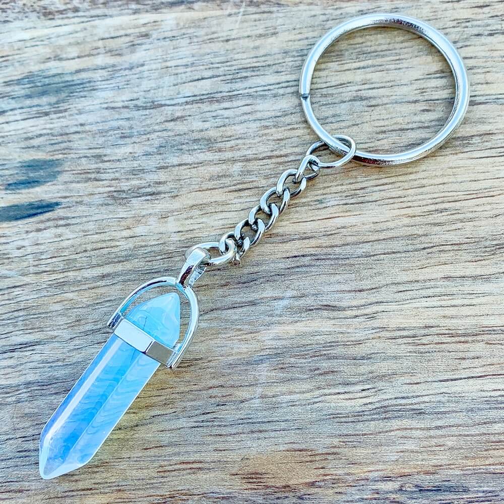 Opalite KEYCHAIN. Shop at Magic Crystals for Crystal Keychain, Pet Collar Charm, Bag Accessory, natural stone, crystal on the go, keychain charm, gift for her and him. Opalite is a great SPIRITUALITY. FREE SHIPPING available. Opalite Crystal Key Chain, Crystal Keyring, Opalite Crystal Key Holder. Opal, opalita stone.