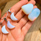 Looking for Opalite Jewelry? Find Opalite Stone Moon Pendant Necklace at Magic Crystals. Find the best selection of opalite pendants here at MagicCrystals.com Opalite stabilizes mood swings and helps in overcoming fatigue. Our Moon opalite gemstone pendant is a delightful way to enjoy the beauty and energy of crystals.