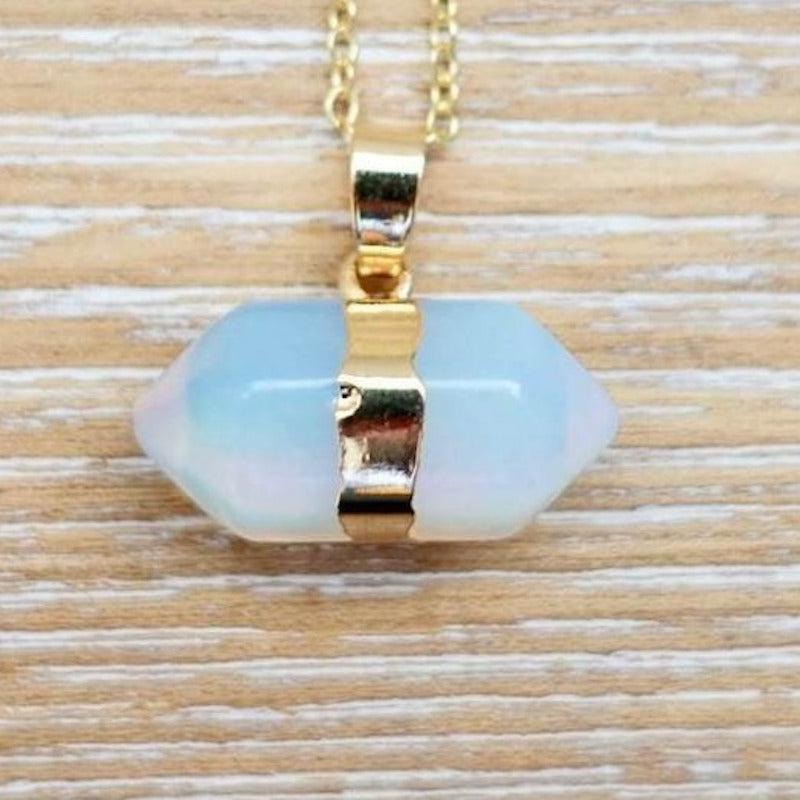 Find the best selection of opalite pendants here at MagicCrystals.com. Opalite stabilizes mood swings and helps in overcoming fatigue. Our double point opalite gemstone pendant is a delightful way to enjoy the beauty and energy of crystals at all times. Shop at www.magiccrystals.com