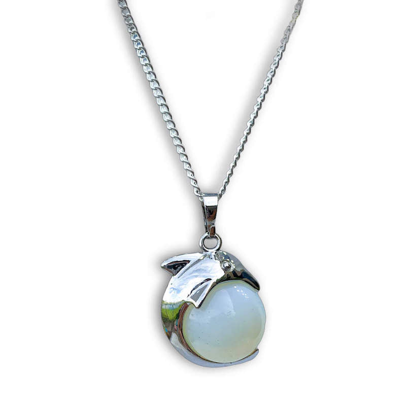 Opalite-Sphere-Dolphin-Pendant-Necklace. Dolphin Necklace - Elegant Ocean-Themed Jewelry for Women Dolphin Charm Necklace at Magic Crystals. Boho Style Jewelry with Natural Gemstones. Stone Carved Dolphin Necklace Pendant, Beach Surf Ocean Boho Gemstone Whale Fairtrade Gift. These beautiful stone necklaces are all hand carved.