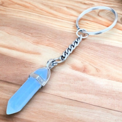 Opalite-Double-Point-Keychain. Opalite KEYCHAIN. Shop at Magic Crystals for Crystal Keychain, Pet Collar Charm, Bag Accessory, natural stone, crystal on the go, keychain charm, gift for her and him. Opalite is a great SPIRITUALITY. FREE SHIPPING available. Opalite Crystal Key Chain, Crystal Keyring, Opalite Crystal Key Holder. Purple stone keys