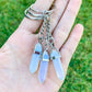 Opalite-Double-Point-Keychain. Opalite KEYCHAIN. Shop at Magic Crystals for Crystal Keychain, Pet Collar Charm, Bag Accessory, natural stone, crystal on the go, keychain charm, gift for her and him. Opalite is a great SPIRITUALITY. FREE SHIPPING available. Opalite Crystal Key Chain, Crystal Keyring, Opalite Crystal Key Holder. Purple stone keys