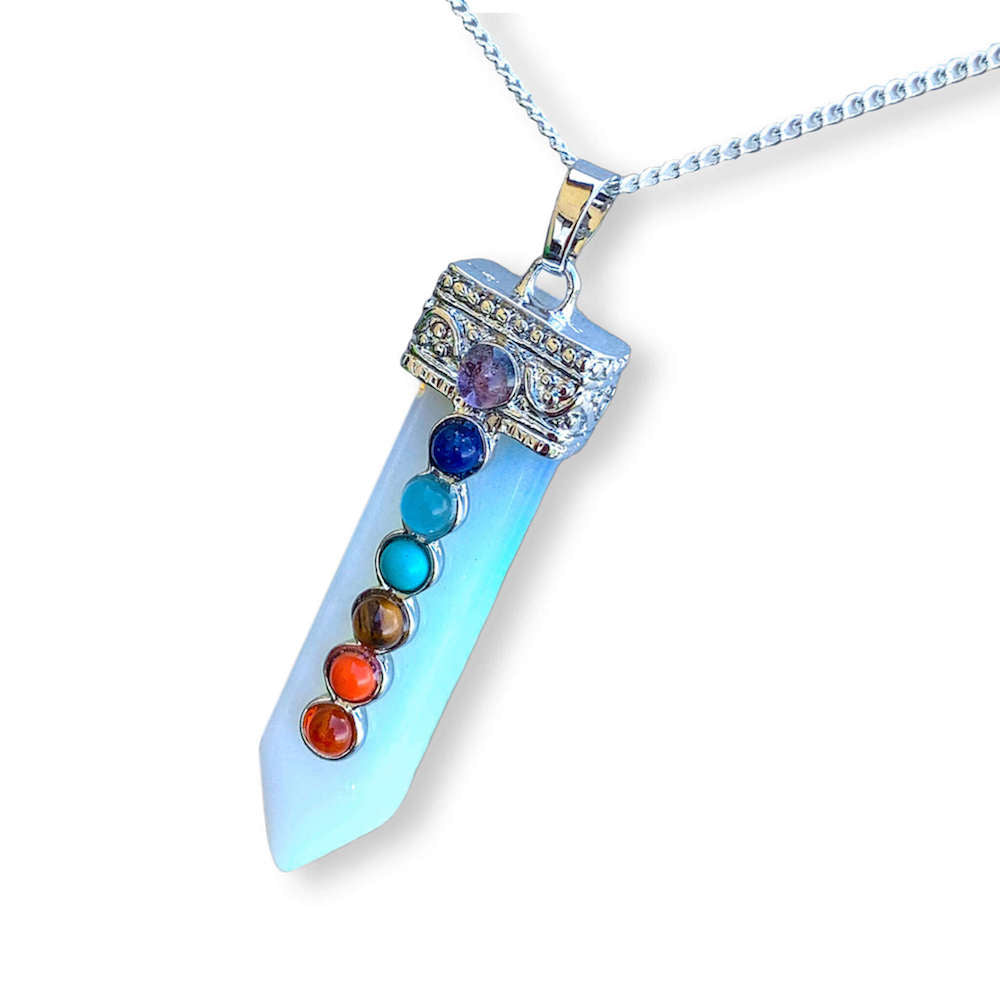 Opalite-seven-chakras-necklace.ooking for Chakra Jewelry? Shop for 7 Chakra Single Point Pendant Necklace at Magic Crystals. This pendant features seven stones that connect with the seven chakras all aligned atop a crystal point. chakra necklace, 7 chakra stones, yoga necklace with crystal gemstones. handmade crystals, gifts for her, gifts for him