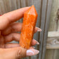 Looking for Natural orange calcite? Shop at Magic Crystals for a wand tower point obelisk semiprecious gemstone crystal Reiki Healing Crystals, Sacral Chakra, Passion, Protection.  Powerful for connecting with source energy.  FREE SHIPPING available. Orange Stone Calcite Stone.