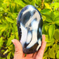 Looking for Large Orca Agate stones? Shop at our crystal shop for genuine Orca Agate Freeform - Polished Orca Agate Carving, Orca Agate at Magic Crystals. Natural Orca Agate is a powerful reminder of the ageless spirit by raising the vibration of the physical vehicle. FREE SHIPPING. Orca-Agate-Freeform-A