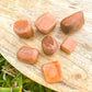 Buy Peach Aventurine Tumbled Stones | Peach Aventurine Polished Gemstones | Bulk Crystals at Magic Crystals. Red aventurine gently increases the energy of the sacral chakra. It helps with decision-making and can boost creativity. Peach Aventurine is a stone often recommended to help with anxiety, worry, stress, and shyness.