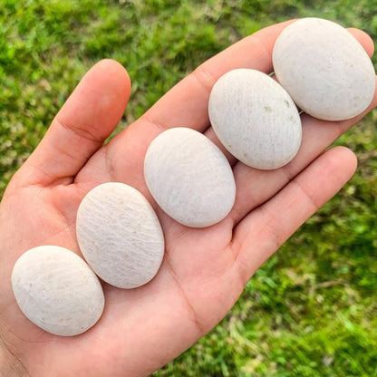 Peach-Moonstone-Palm-Stone. Natural Gemstone Palm Stone.Looking for Natural Gemstone Palm Stone - Worry Meditation Stones? Shop at magiccrystals.com . Magic Crystals carries Palmstones - Meditation Stones with FREE SHIPPING AVAILABLE. Empathetic, supporting and glowing with soft, pretty color, this Jade palm stone is a wonderful crystal gift for someone you love.