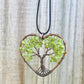Peridot -Tree-of-Life-Copper-Wire-Heart-Necklace. Looking for Copper Jewelry? Magic Crystals offers handmade Heart Copper Wire Wrapped,  Tree Of Life,  Hematite Pendant Necklace, 7th Anniversary Gift, Yggdrasil Necklace for Him or Her Gift. Heart Gift perfect for any occasion. Heart Necklace With gemstones. Tree of Life made of copper in a pendant necklace.
