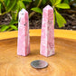 Peruvian-Pink-Rhodonite-Obelisk-40-grams.Shop for handmade Mini Rhodonite Obelisk - Rhodonite Carved Tower - Rhodonite Stone at Magic Crystals. Rhodonite Polished Heart Healing Crystal Gemstone. Rhodonite is a wonderfully peaceful crystal. Enjoy FREE SHIPPING when you shop at magiccrystals.com