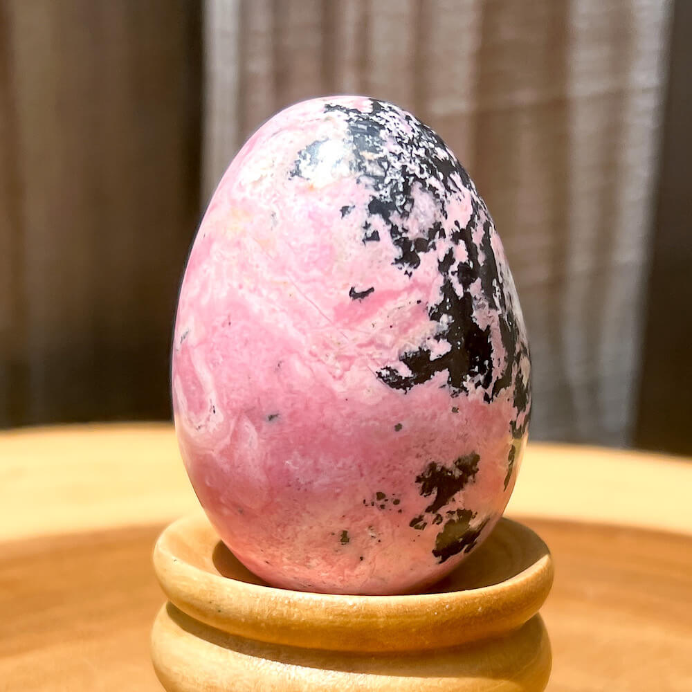 Shop for handmade Pink Rhodonite Egg -  Peruvian Rhodonite Carved Egg at Magic Crystals. Peruvian Pink Rhodonite Carved Egg - B. Rhodonite Polished Egg Healing Crystal Gemstone. Rhodonite is a wonderfully peaceful crystal. Enjoy FREE SHIPPING when you shop at magiccrystals.com. Undrilled crystal egg. Undrilled Pink Egg