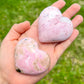 Shop for handmade Pink Rhodonite heart - Peruvian Rhodonite Carved Heart at Magic Crystals. Rhodonite Polished Heart Healing Crystal Gemstone. Rhodonite is a wonderfully peaceful crystal. Enjoy FREE SHIPPING when you shop at magiccrystals.com