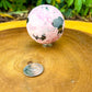 Shop for handmade Pink Rhodonite Sphere - Peruvian Rhodonite Carved Sphere at Magic Crystals. Peruvian Pink Rhodonite Carved Sphere. Rhodonite Polished Sphere Healing Crystal Gemstone. Rhodonite is a wonderfully peaceful crystal. Enjoy FREE SHIPPING when you shop at magiccrystals.com. Undrilled crystal Sphere.