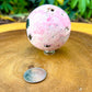Shop for handmade Pink Rhodonite Sphere - Peruvian Rhodonite Carved Sphere at Magic Crystals. Peruvian Pink Rhodonite Carved Sphere. Rhodonite Polished Sphere Healing Crystal Gemstone. Rhodonite is a wonderfully peaceful crystal. Enjoy FREE SHIPPING when you shop at magiccrystals.com. Undrilled crystal Sphere.