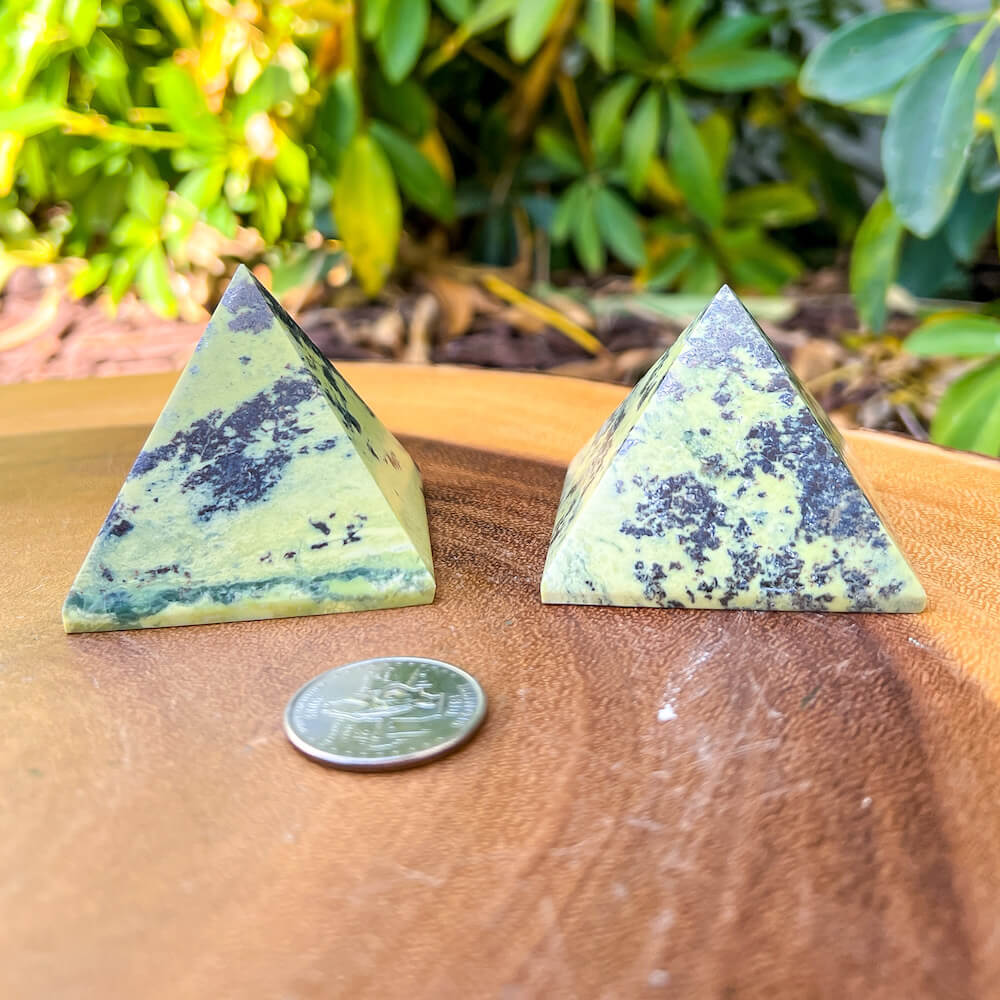 Looking for Green Serpentine Pyramid? Shop at Magiccrystals.com for Genuine Green Peruvian Serpentine Magnatite Pyramid - Serpentine Pyramid - Stone Point. Magic Crystals FREE SHIPPING on quality crystals. Serpentine is associated with the heart chakra and increases love and nurturing.