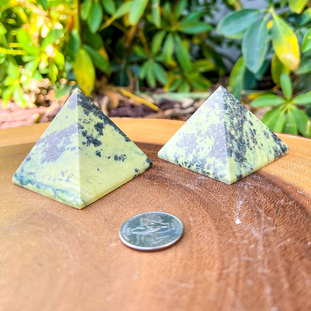 Looking for Green Serpentine Pyramid? Shop at Magiccrystals.com for Genuine Green Peruvian Serpentine Magnatite Pyramid - Serpentine Pyramid - Stone Point. Magic Crystals FREE SHIPPING on quality crystals. Serpentine is associated with the heart chakra and increases love and nurturing.