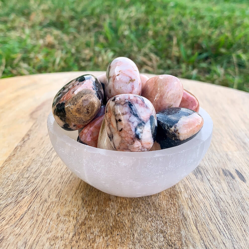 Looking for Pink Zebra Jasper? Shop at Magic Crystals for Pink Zebra Jasper Tumbled Stones, Pink Zebra Jasper Tumble Stone, and Polished Jasper. Pink Jasper Protective & Grounding stone. Brings relaxation, calm & joy. Soothes anxiety. Brings stability. FREE SHIPPING available. Jasper from Madagascar.
