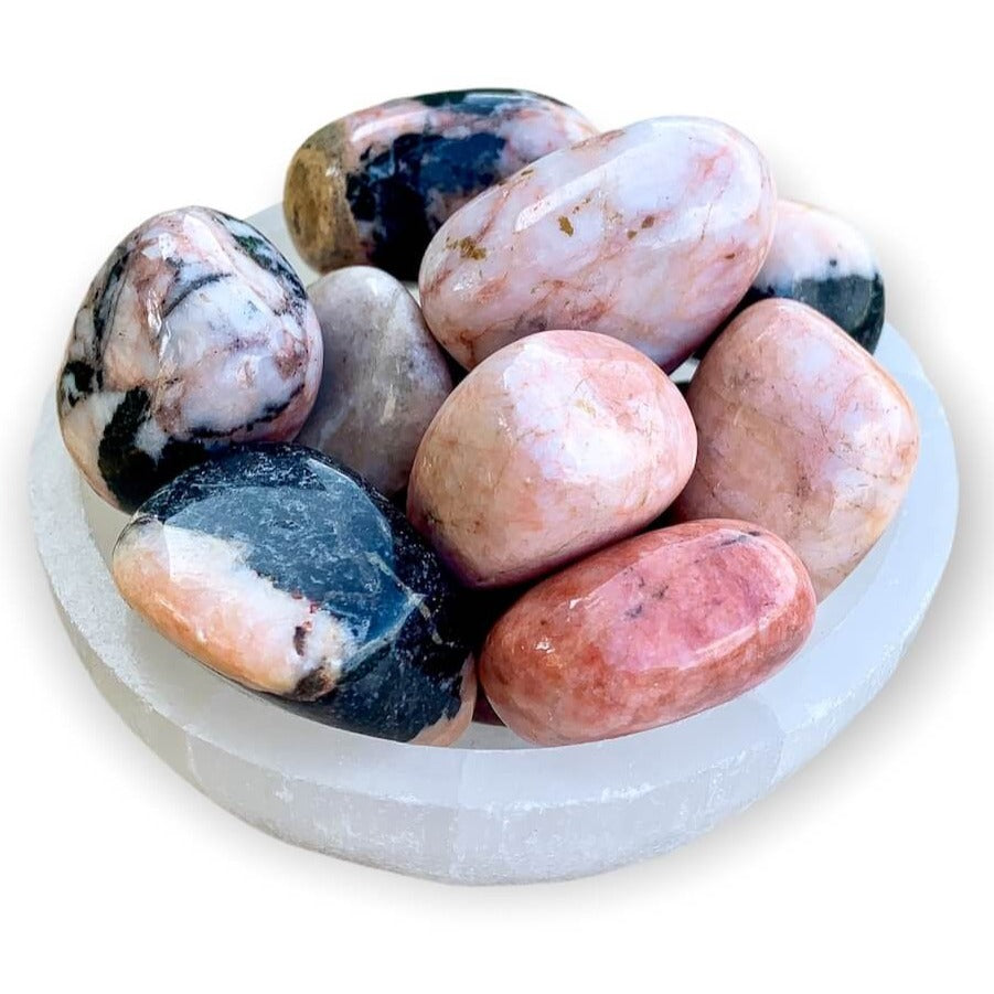 Looking for Pink Zebra Jasper? Shop at Magic Crystals for Pink Zebra Jasper Tumbled Stones, Pink Zebra Jasper Tumble Stone, and Polished Jasper. Pink Jasper Protective & Grounding stone. Brings relaxation, calm & joy. Soothes anxiety. Brings stability. FREE SHIPPING available. Jasper from Madagascar.