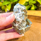 Shop from High-Quality Pyrite with Cubes Cluster from Peru, Fools Gold at Magic Crystals. Pyrite Freeform Protect Stone, Rough Pyrite, Raw Pyrite Freeform! Pyrite stone. We carry a wide variety of clear quartz gemstones, Howlite, and quartz specimens. FREE SHIPPING AVAILABLE.