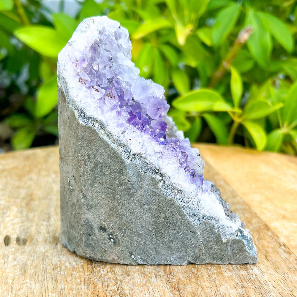Cut base Brazilian Rainbow Amethyst Church Cathedral Sparkly Druze Raw Crystal Cluster  at Magic Crystals. This gemstone is a February Birthstone perfect for Third Eye Chakra and Crown. This gemstone helps for Spirituality and Wisdom. Natural Amethyst offers FREE SHIPPING and the best quality gemstones.